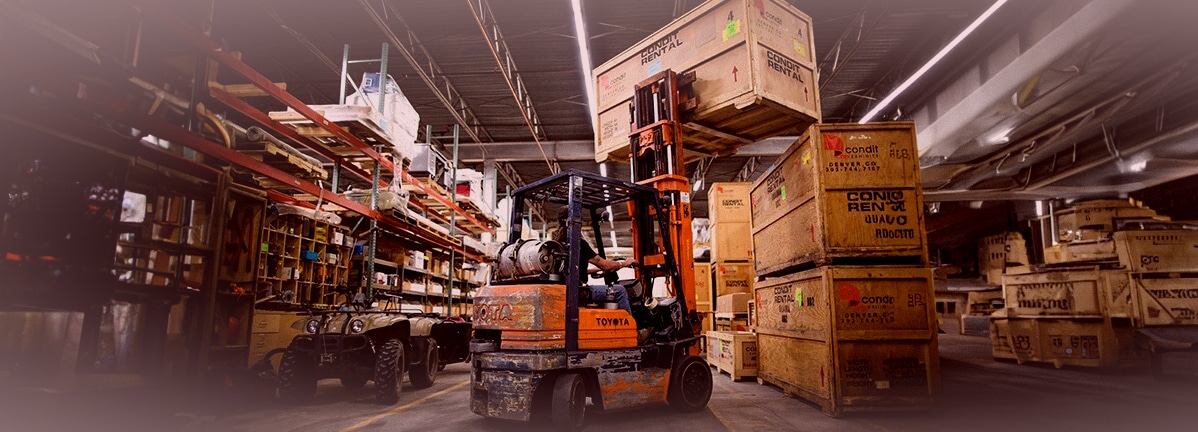 Drayage, Forklift Transporting Trade Show / Exhibit Materials to Storage Area Near Convention Center