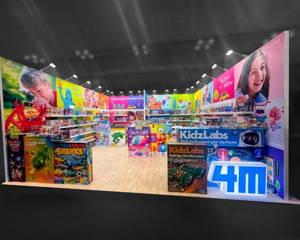 Colorful retail-style trade show booth for toys with product displays by Local Exhibits