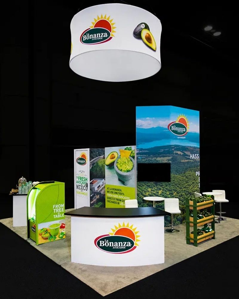 La Bonanza Avocados custom trade show booth with avocado product displays and overhead signage by Local Exhibits