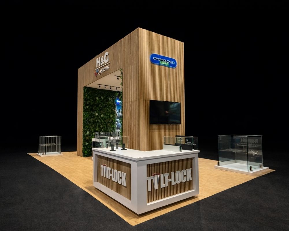 H&C Systems trade show booth with wooden design and branded product displays by Local Exhibits