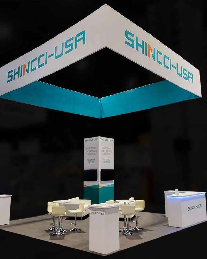 Shincci-USA branded trade show booth with overhead signage and product displays by Local Exhibits