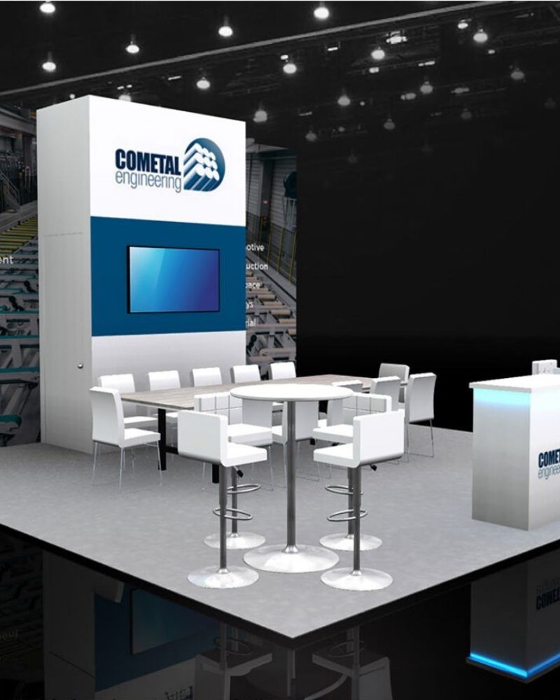 Cometal Engineering custom trade show booth with branded display and seating area by Local Exhibits