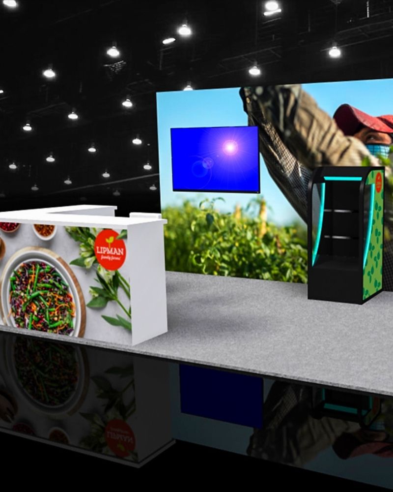 Lipman branded trade show booth with large graphic backdrop and display counter by Local Exhibits