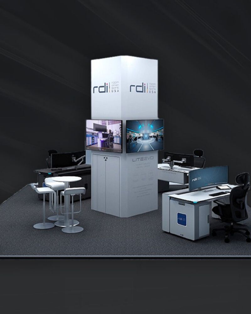 RDLI compact trade show booth with digital displays and workstation setup by Local Exhibits