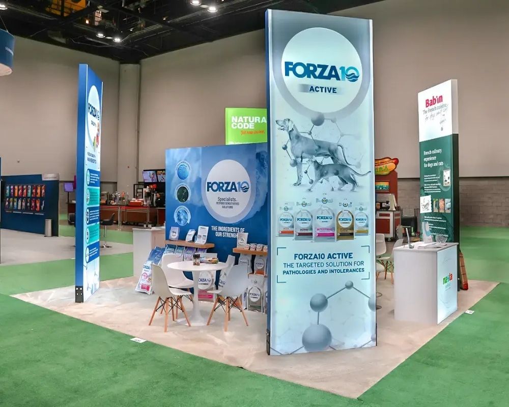 Custom trade show booth design with tall branded display panels by Local Exhibits