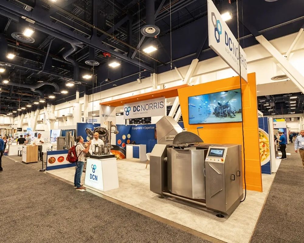 Custom industrial trade show booth with equipment displays by Local Exhibits